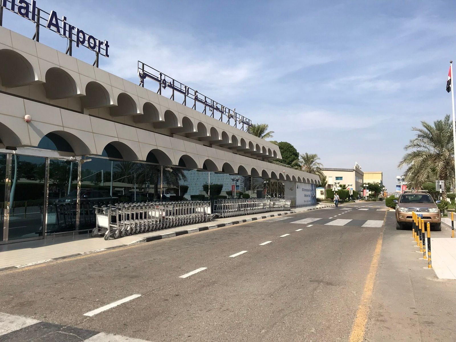Main terminal facade and drop-off road at Ras Al Khaimah International Airport